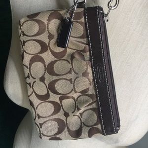 Coach wristlet with adorable pleats brown