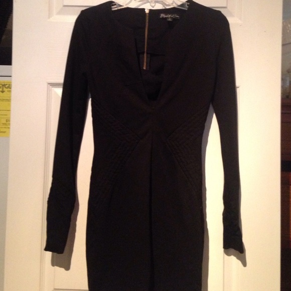 Sexy but coveted long sleeve little black dress