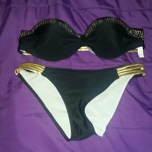 NWOT brand new black and gold bathing suit