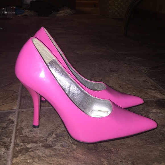 Hot pink stiletto pumps