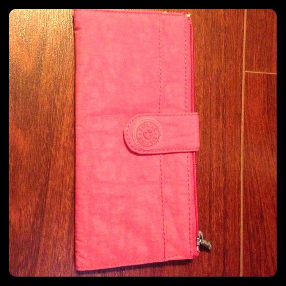 Pink Kipling travel wallet