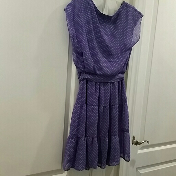 A classic purple polko dot dress. Girls size 16.
