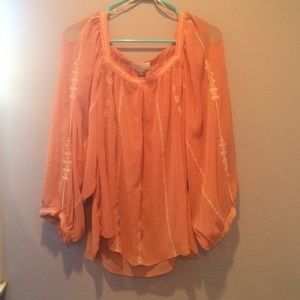 Peach/ coral flowy blouse.