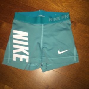 Teal Nike pros