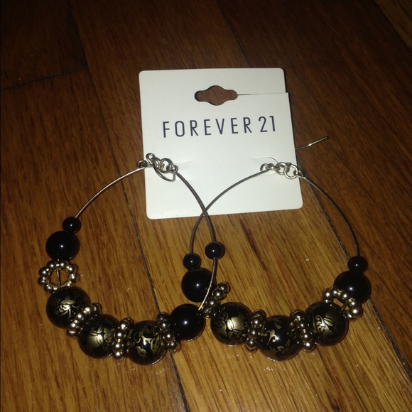 Tear shaped black with gold detail earrings