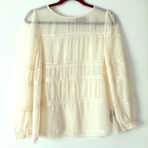 Sheer cream peasant top