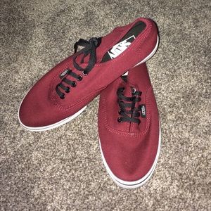 Maroon and black Vans