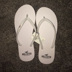 White Hollister flip flops