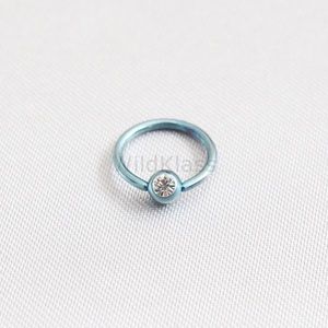 Captive Bead Gemmed Dimple Ball Ring