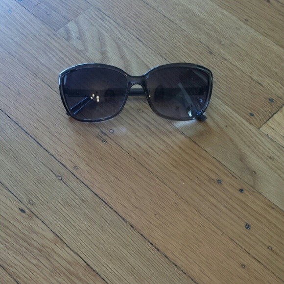 One pair of silver sunlgasses