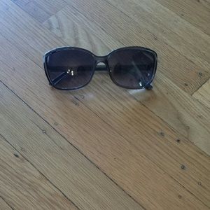 One pair of silver sunlgasses