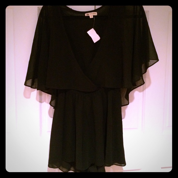 Trendy black sexy sheer jumper- never worn!!