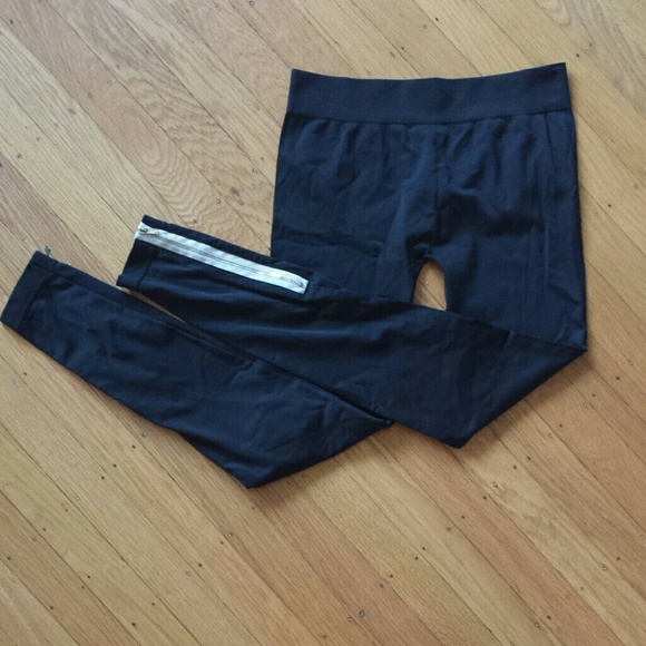 Black leggings with accent white and silver zipper