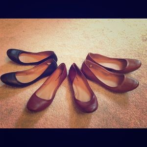 3 pairs of black and brown flats
