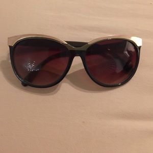 Gold rim cat eye sunglasses