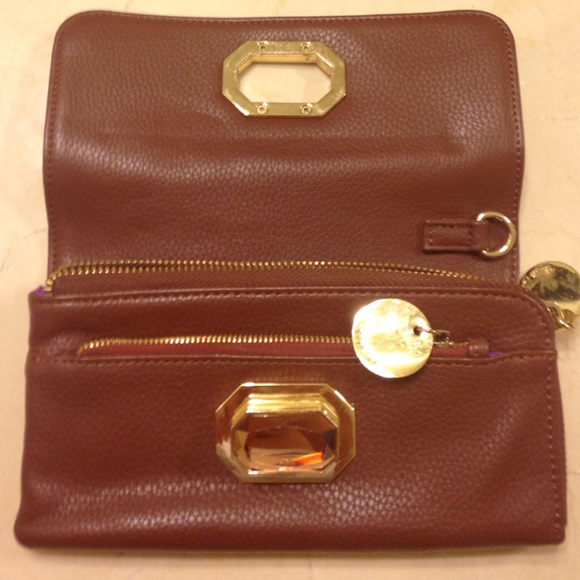 Brown leather clutch