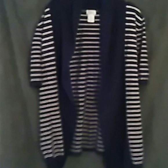 Black and white striped sweater with black