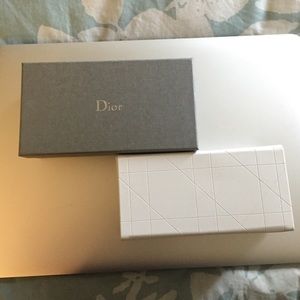 White Dior sunglass case