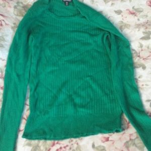 a green stretchy knit sweater