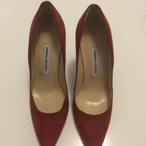 Manolo Blahnik round toe pumps.