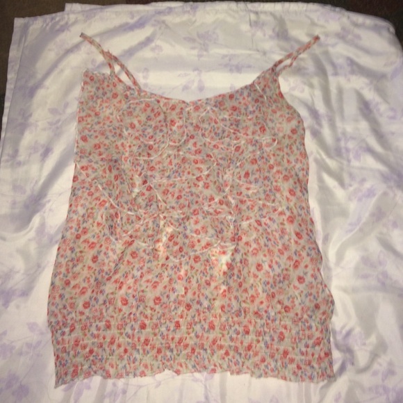 selling 3 blouses all together.