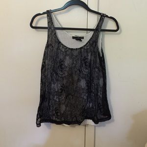 Black lace shirt with white underneath