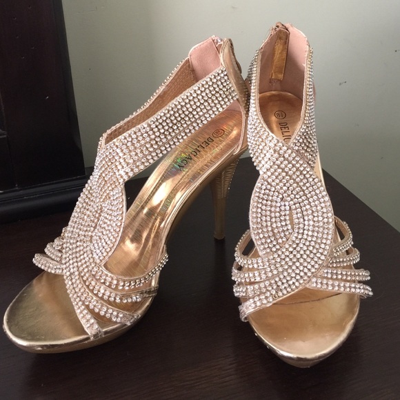 Delicacy gold with diamond heels. SZ 8.5