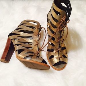 Brand new pair of gold sandals