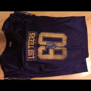 Size lg but fits more like a med. LSU jersey