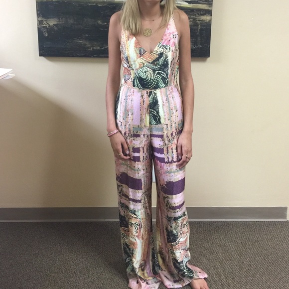 Pink satin wide leg jumpsuit with crisscross back