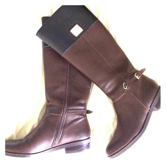 Brown and black riding boots