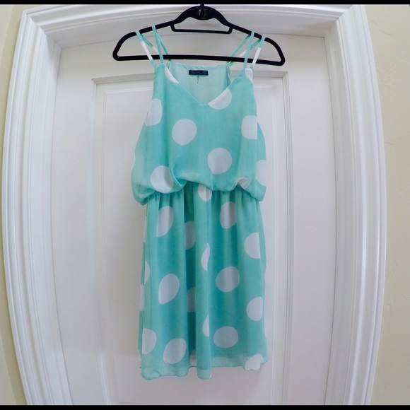 Aqua polka dot dress with split strap.
