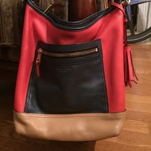 navy, red, and tan coach purse!