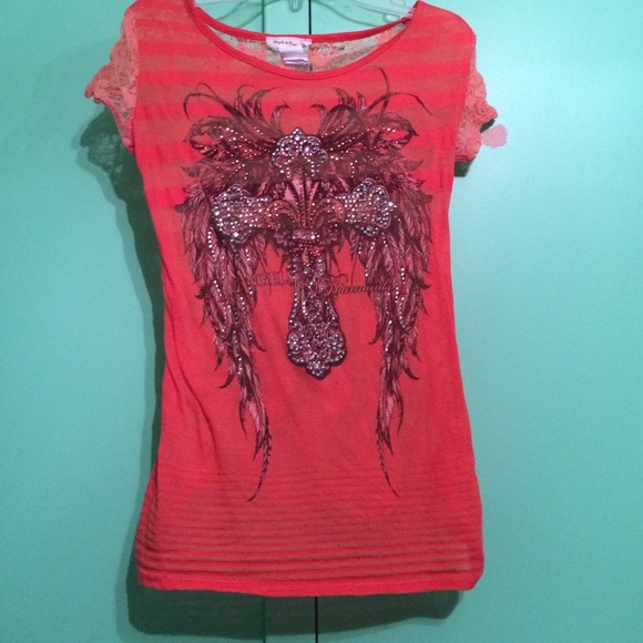 An all orange buckle shirt