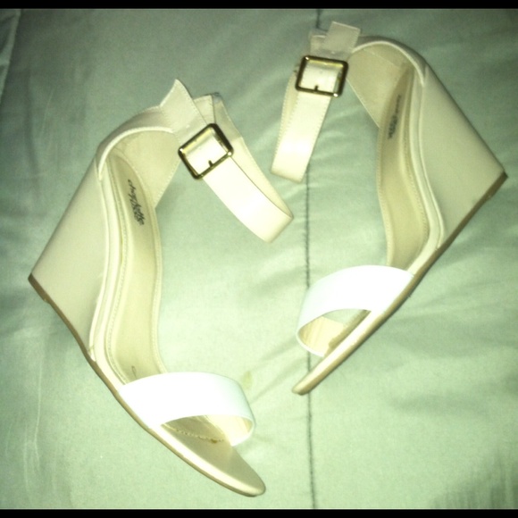 White and nude wedges.