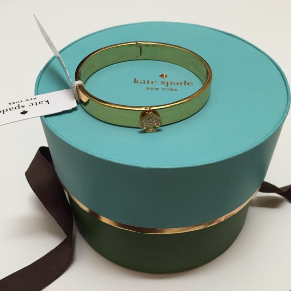 Kate Spade gold bangle with spade, NBW NWT