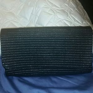 Black woven clutch