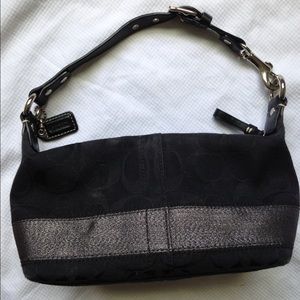 Coach purse in black signature fabric