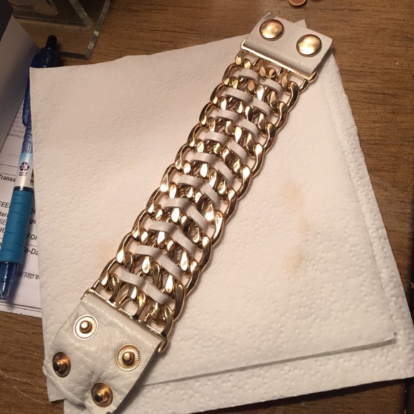 White leather and gold tone chain braclet