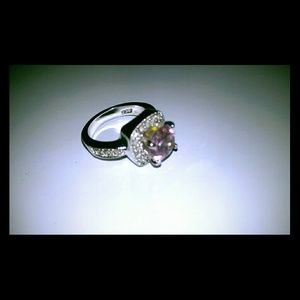 Pink stone and silver accent ring
