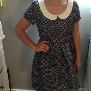 Navy and white patterned dress.