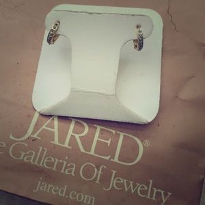 Gold diamond earrings .