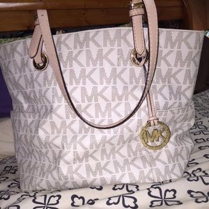 White Michael Kors Purse.