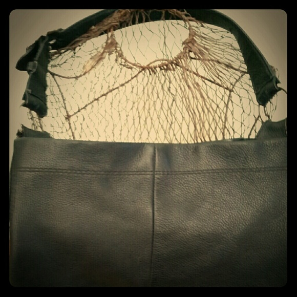 Authentic black leather Coach purse.