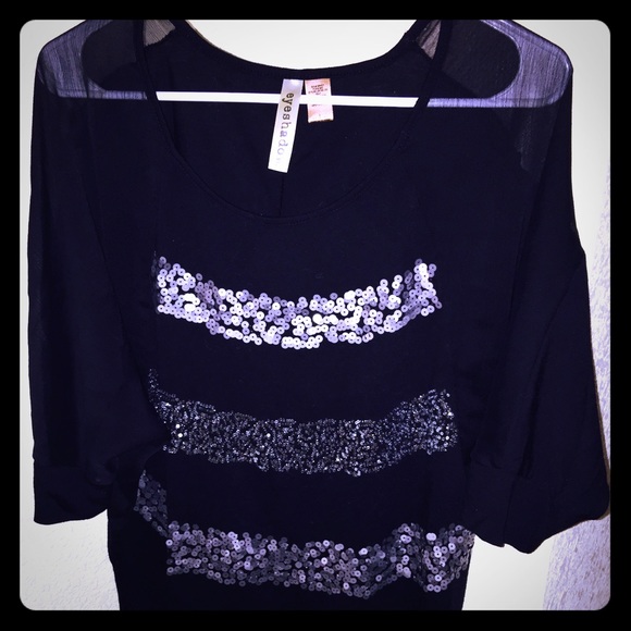 Eyeshadow cute sparkly black top w/ sheer sleeves!