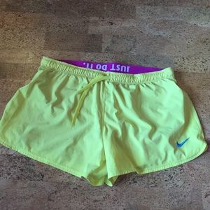 Nike dri-fit yellow shorts with purple spanx