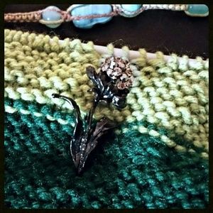 Elegant black and white flower brooch