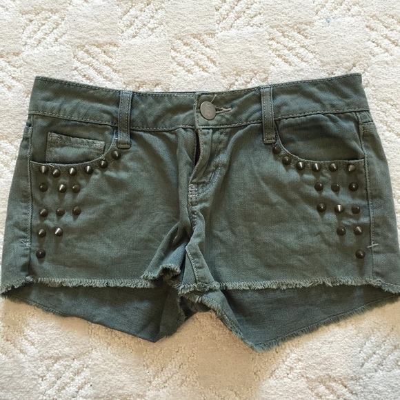 Navy green shorts with spikes