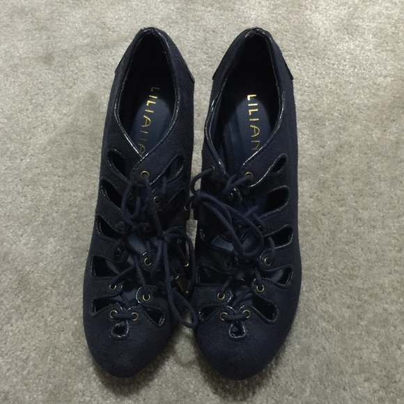 Blue suede lace up high heel shoes