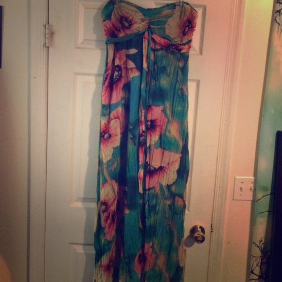 A beautiful long strapless dress.